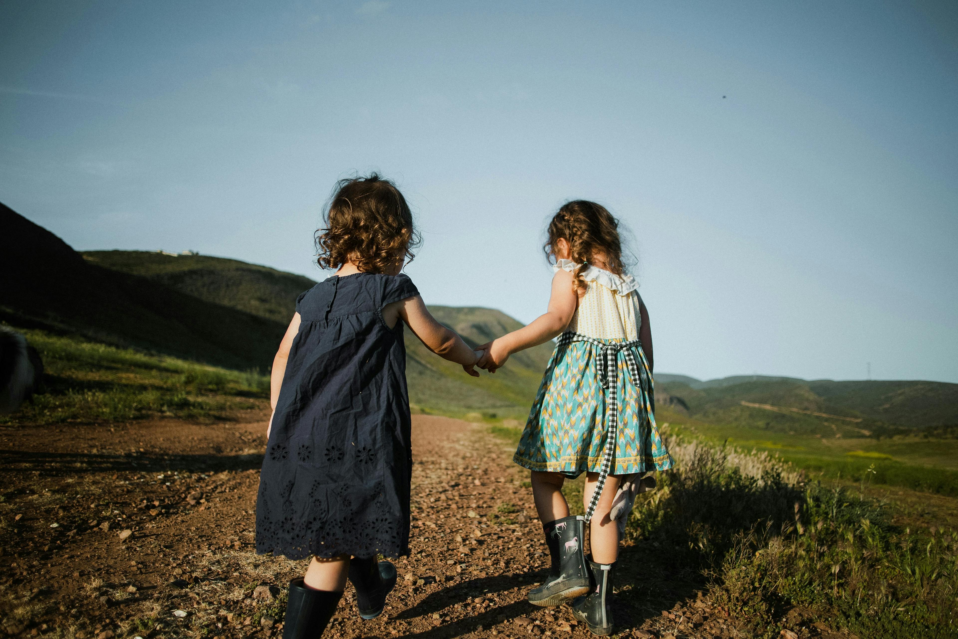 Girls holding hands