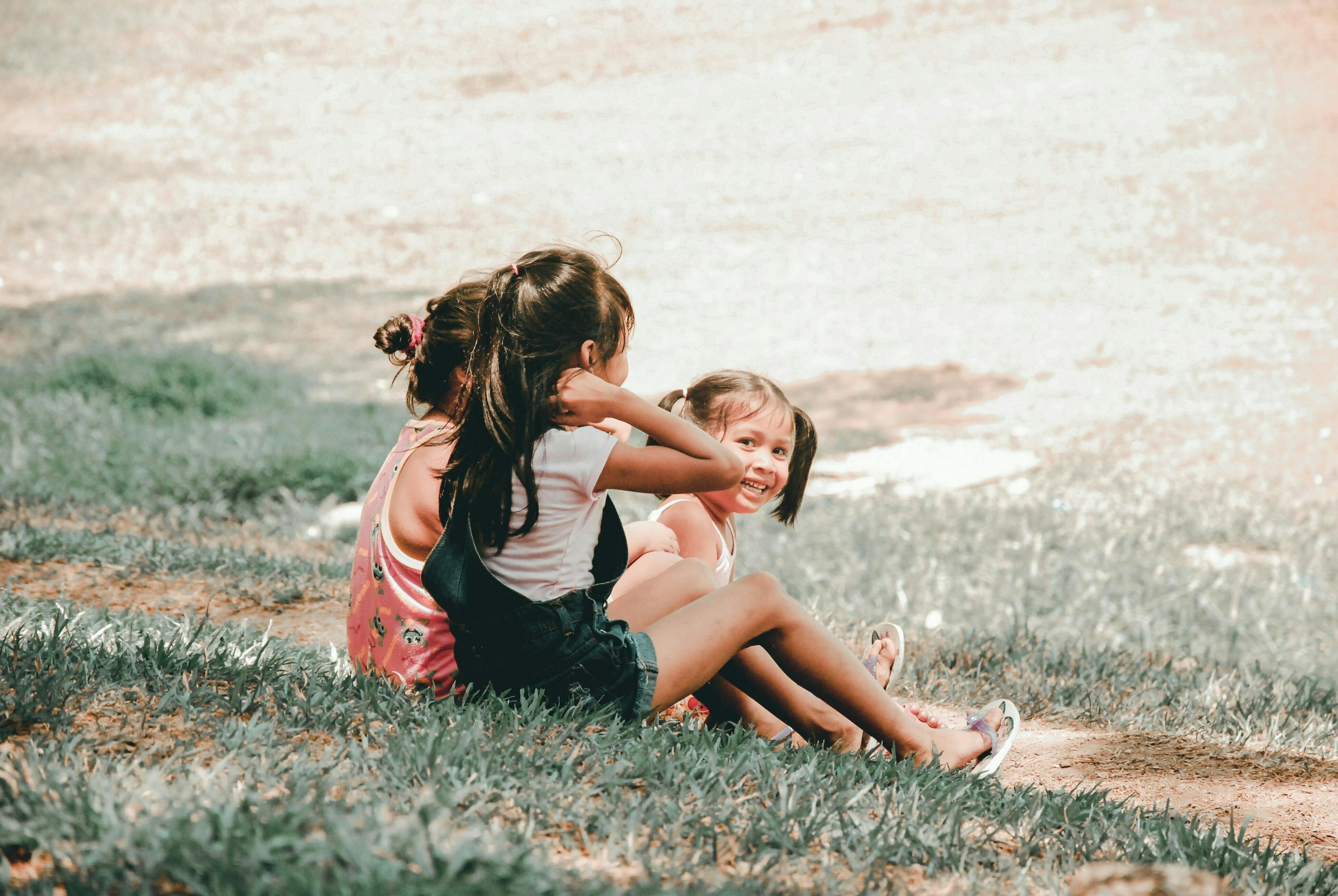 Girls sitting on grass